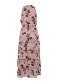 Robe maxi rose sans manches à volants avec motif floral noir et détail de col haut avec nœud.