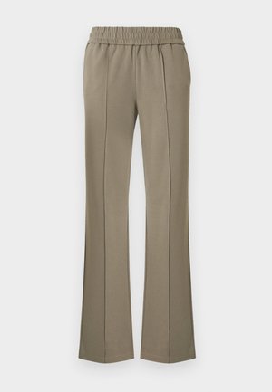 Light brown, stretchy pants with an elastic waistband, featuring front seams and flared legs, made of soft fabric with a smooth texture.