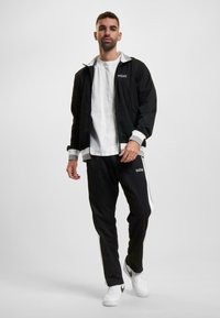 UNFAIR ATHLETICS Sweatjakke - black