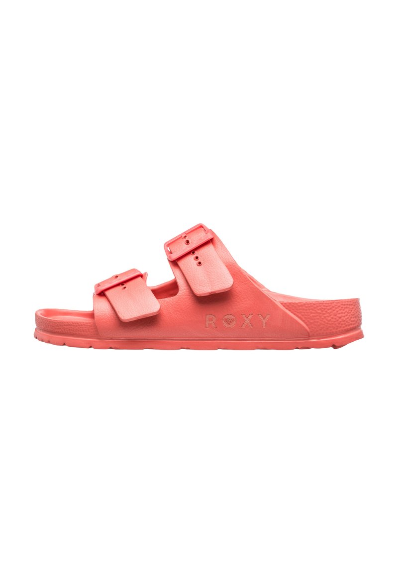 Coral Roxy slide sandal med to justerbare strop-buckles, en struktureret sål og en holdbar gummiydersål.