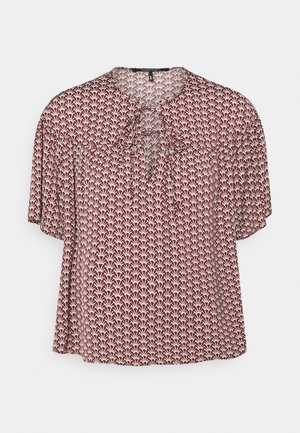 Red and cream patterned blouse with a loose fit, round neckline, short sleeves, and tie detail at the neck. Features a floral design.