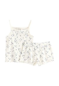 Kaksiosainen kukkakuosiset oleskeluasusteet, joissa on hihaton toppi ja shortsit. Valmistettu kevyestä kankaasta, joka on valkoisella pohjalla sinisiä kukkia.