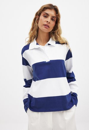 Navy and white horizontal striped long-sleeve polo shirt with a collar, featuring a relaxed fit and soft cotton material.
