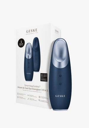 Varm og kold øjeenergizer i navy med sølv accenter; har knapper til temperaturkontrol, ergonomisk design og branding på emballagen.