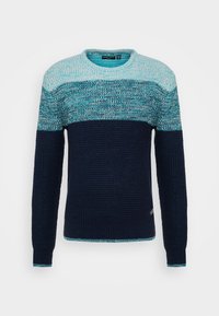 Stickad tröja med en gradientdesign i turkos och marinblå färger, rund halsringning, samt ribbade ärmar och nederkant. Strukturerad tyg.