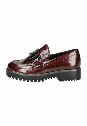 Burgundy patent leather loafer with flat, textured black sole and decorative black buckle detailing on the upper.