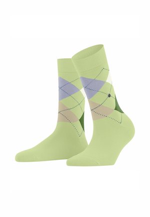 Chaussettes vertes avec un motif argyle comportant des diamants lilas clair, verts et beige. Un matériau doux et des poignets côtelés améliorent le confort.