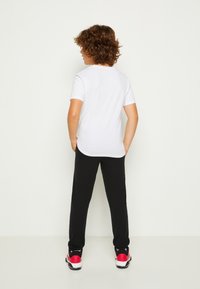 Jordan JUMPMAN AIR UNISEX - T-shirt basic - white