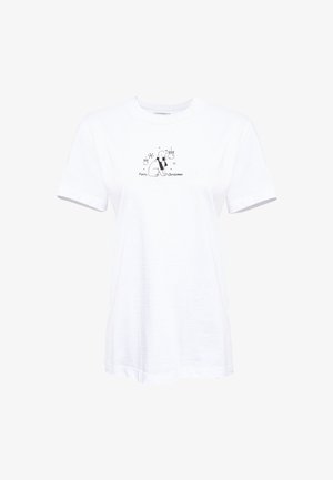 White cotton t-shirt with short sleeves, featuring a black print of a dog and "Furry Christmas" text, decorated with holiday ornaments.