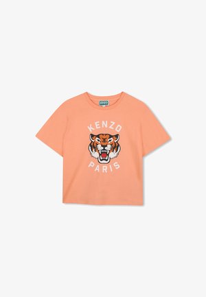 T-shirt en coton pêche à manches courtes, avec un motif tigre noir et orange et le texte "KENZO PARIS" en blanc en dessous.