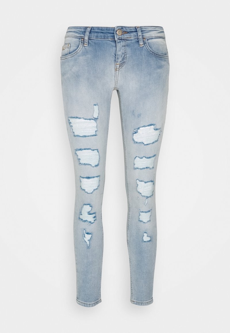 Světlé modré skinny džíny vyrobené z denimu, s roztrženými místy a detaily roztržení. Úzký střih s klasickým pasem a manžetami.