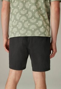 Next REGULAR FIT - Tréningruha alsók - black