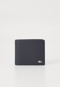 Portofel din piele bleu marina cu o textură netedă, design bifold și un accent argintiu în formă de crocodil pe față.