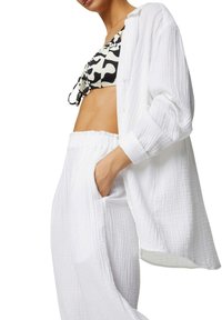 Marks & Spencer PURE COTTON ELASTICATED WAIST RELAXED TROUSERS - Strandaccessoire - soft white