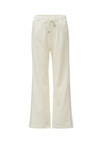 Pantalons de survêtement couleur crème avec une taille élastique, cordon de serrage avant, jambes droites et bandes latérales gris clair.
