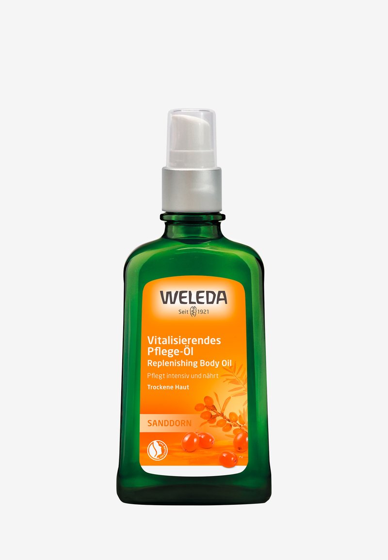 Bottiglia di vetro verde con un erogatore bianco e un'etichetta arancione. Il testo recita "Weleda Vitalisierendes Pflege-Öl Replenishing Body Oil" con un'illustrazione di olivello spinoso.