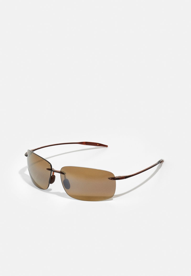 Sunglasses med bruna linser, rektangulär form, tunna metalliska bruna bågar och gummikuddar för komfort.