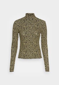 Zwarte lange mouw turtleneck top met een bloemenpatroon in geel, gemaakt van een aansluitende rekstof met een gladde textuur.