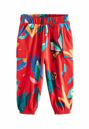 Pantalones con cintura elástica roja, estampados botánicos abstractos y coloridos con mariposas, bolsillos laterales y tobillos fruncidos.