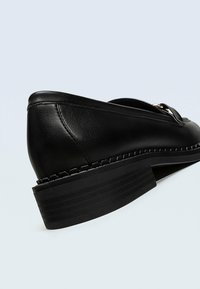Stradivarius Slip-ons - black
