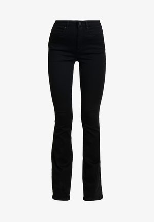 Sorte høy midje skinny jeans med lett flare ved anklene, med front- og baklommmer samt knappelukking.