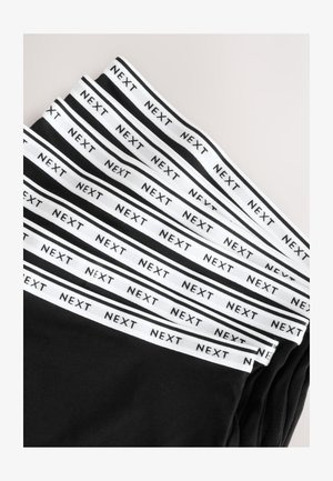 Boxers noirs pour hommes avec des tailles élastiques blanches. Les tailles présentent le logo "NEXT" répété et sont soigneusement disposées en couches.