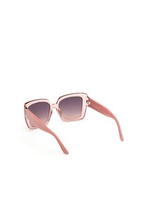 Lunettes de soleil transparentes roses avec des verres carrés, teinte dégradée violette et branches texturées dans une teinte rose complémentaire.