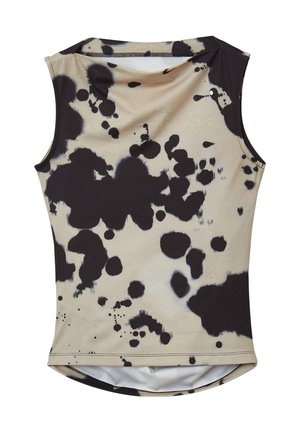 Débardeur sans manches en tissu beige avec des motifs de taches noires. Ourlet arrondi et col rond, fabriqué à partir d'un matériau lisse et extensible.