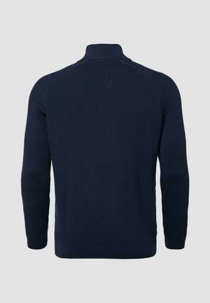 Marineblauwe, gebreide pullover trui met een hoge kraag en lange mouwen. Heeft een geribbelde textuur en een rechte zoom zonder zichtbare hardware.