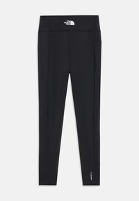 Fekete leggings rugalmas anyagból, magas derekú, oldalsó zsebekkel és egy kis fehér logóval a szegély közelében.