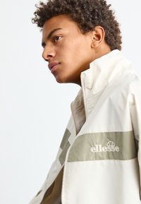 Ellesse DE ROSSI - Poletna jakna - beige