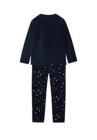 Navy fleece long-sleeve top paired with matching navy pants featuring a starry print in white. Soft texture, simple design, and elastic waist.
