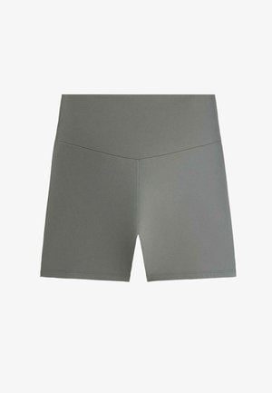 Magas derekú, varrás nélküli szürke sportnadrág rövidnadrág, V-alakú derékrész díszítéssel, a kényelem és rugalmasság érdekében tervezve.