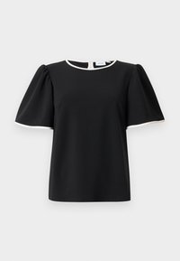 Blouse noire à manches courtes avec des manches bouffantes et un bord blanc au niveau de l'encolure et des bords de manches, dotée d'une fermeture à boutons à l'arrière.