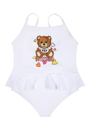 Witte zwemoutfit met een uitlopende rok, voorzien van een teddybeerafbeelding met het label "TOY" en kleurige hartaccenten. Spaghetti bandjes maken het ontwerp af.