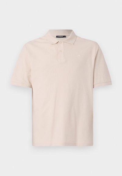Lys beige polo shirt, korte ermer, kragehals, to-knappers placket, subtil logo på brystet, laget av mykt bomullsmateriale.