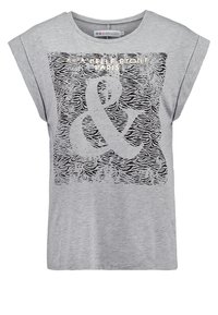 Harmaa lyhythihainen t-paita, jossa on mustavalkoinen sebra-kuvio ja kultaisella painettuna "&" ja "A LA BELLE ÉTOILE PARIS".