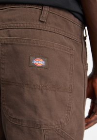 Dickies CARPENTER PANT - Trousers - dark brown