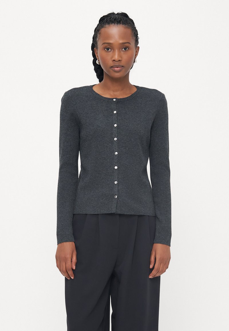 Dark grey long-sleeve cardigan made of knit fabric, featuring a round neckline and front button closure with silver accents.