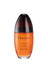 Calvin Klein Obsession eau de parfum spray i en rundet oransje glassflaske med en avsmalnet mørkebrun kork og svart skrift på forsiden.
