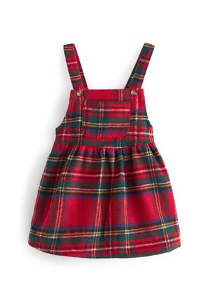 Rode geruite jurk met verstelbare bandjes, voorzien van een geplooide rok, een voorzak en gele en groene accenten in het patroon. Zachte stoftextuur.