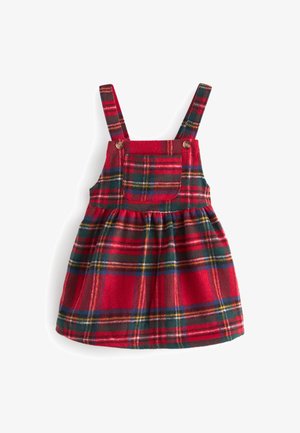 Robe à carreaux rouges avec bretelles réglables, dotée d'une jupe froncée, d'une poche avant et d'accents jaunes et verts dans le motif. Texture de tissu douce.