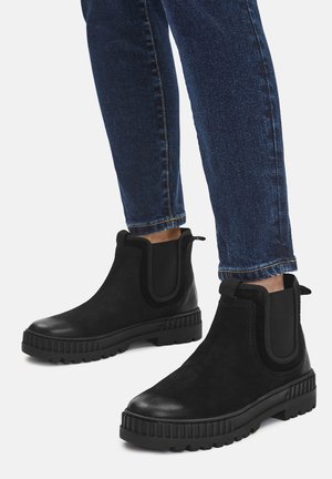 CHELSEA - Zimné čižmy - black