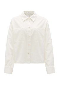 White cotton button-up shirt with a pointed collar, long sleeves, and two front pockets. Features a smooth texture and pearlescent buttons.