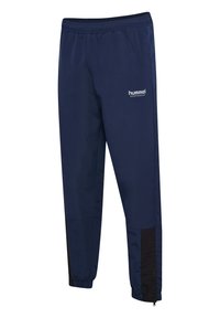 Marineblauwe sportieve joggingbroek van lichtgewicht stof, met een elastische tailleband en zwarte accenten bij de pijpen. Hummel-logo zichtbaar.