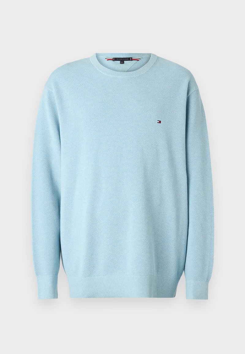 Light blue pullover sweater made of textured fabric, featuring a crew neck and ribbed cuffs. Small logo on the left chest.