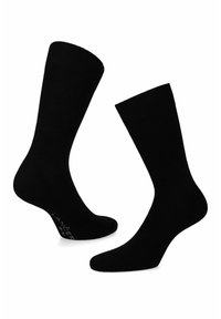 Czarne bawełniane skarpetki o gładkiej fakturze i elastycznym ściągaczu. Każda skarpetka ma wzmocnioną piętę i palce, a na podeszwie znajduje się subtelne logo.