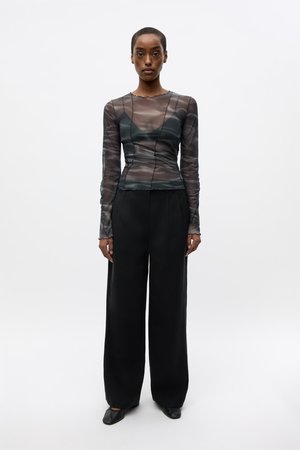 DORE PANTS - Trousers - black