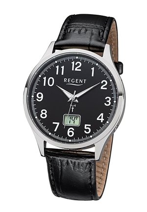 Round black watch with white numerals, silver bezel, and black leather strap. Features an LCD display showing temperature.