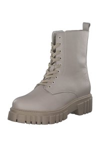 Hellbeiger Knöchelstiefel aus Leder mit strukturierter Oberfläche, ausgestattet mit Ösen-Schnürdesign und einer kräftigen, profilierten Sohle.